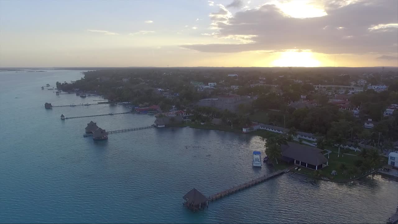 Sunset over Mexican coastal city.