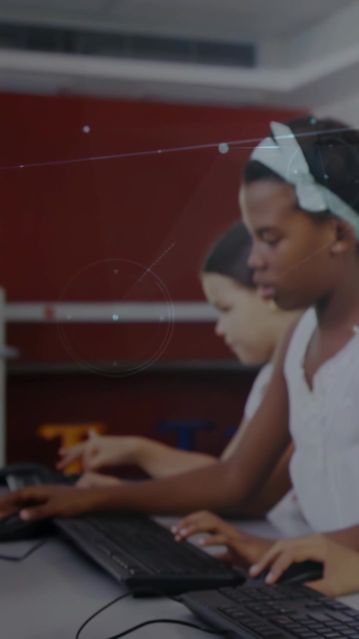 Vertical video: Monitor task appearing, student typing, clicking in class, overlays expanding