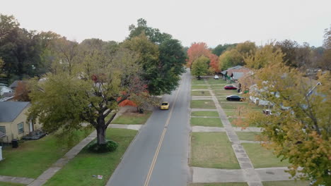 increase elevation while traveling through residential neighborhood in autumn