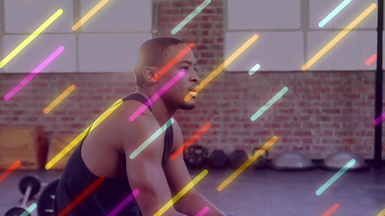 Gym trainee bracing bench rowing weight training resting while diagonal streaks sweeping cam moving