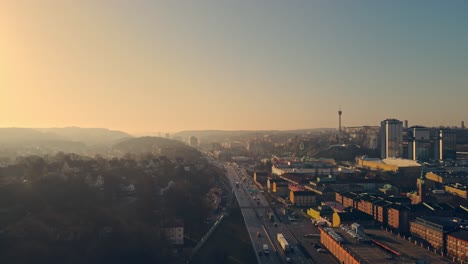 traffic at highway e6 southbound with gothia tower and liseberg amusement park in the background at sunrise in gothenburg, sweden