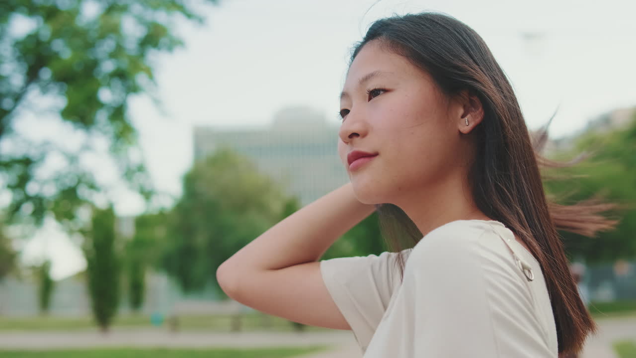 Portrait of a Young Asian Woman Outdoors