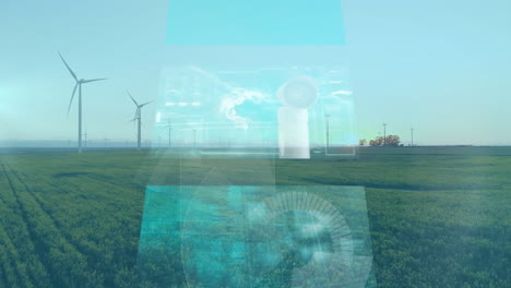 wind turbines in green field with digital technology overlay animation