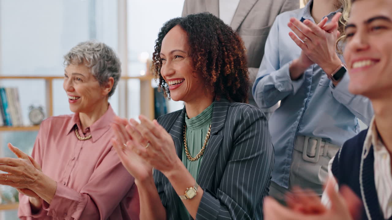 Business Team Clapping and Celebrating Success