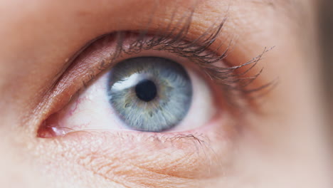 Extreme-Close-Up-Of-Eye-Opening-And-Closing-As-Man-Looks-At-Camera-In-Studio