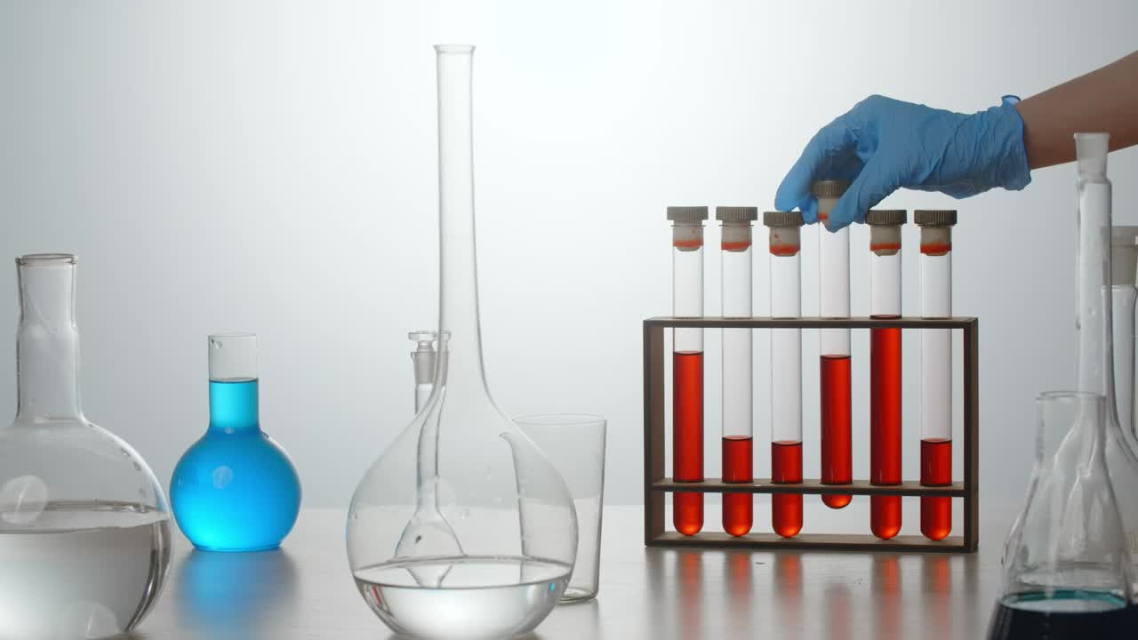 Lab Experiment with Test Tubes and Red Liquid