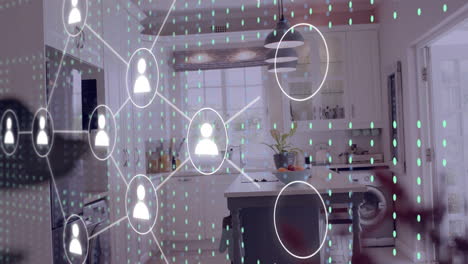 network of connected user icons animation over modern kitchen background