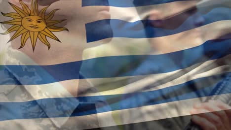 animación de la bandera de uruguay sobre varios soldados