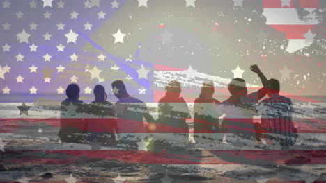 animation of flag of usa over diverse friends sitting on beach