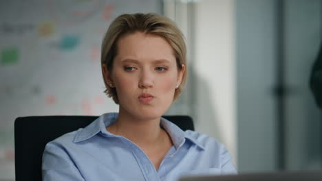 pensive woman manager thinking at project in office closeup. man bringing coffee