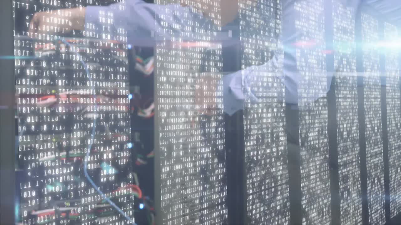 Animation of data with man connecting cables on computers