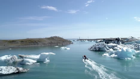 icebergs and boat tour at jokulsarlon glacier lagoon, iceland