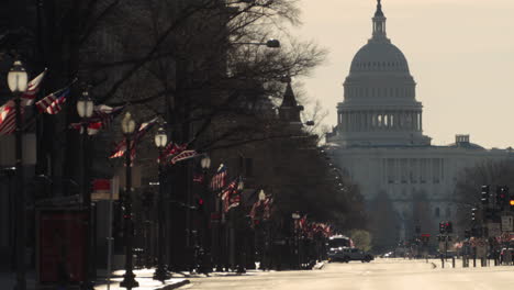 flags waving along pennsylvania avenue in washington dc with us capitol in background