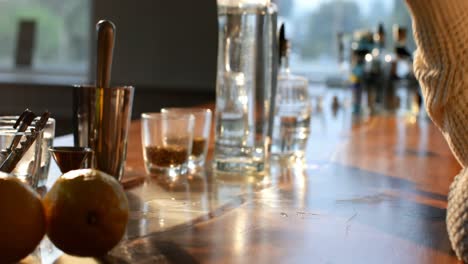 female worker having gin in distillery factory 4k