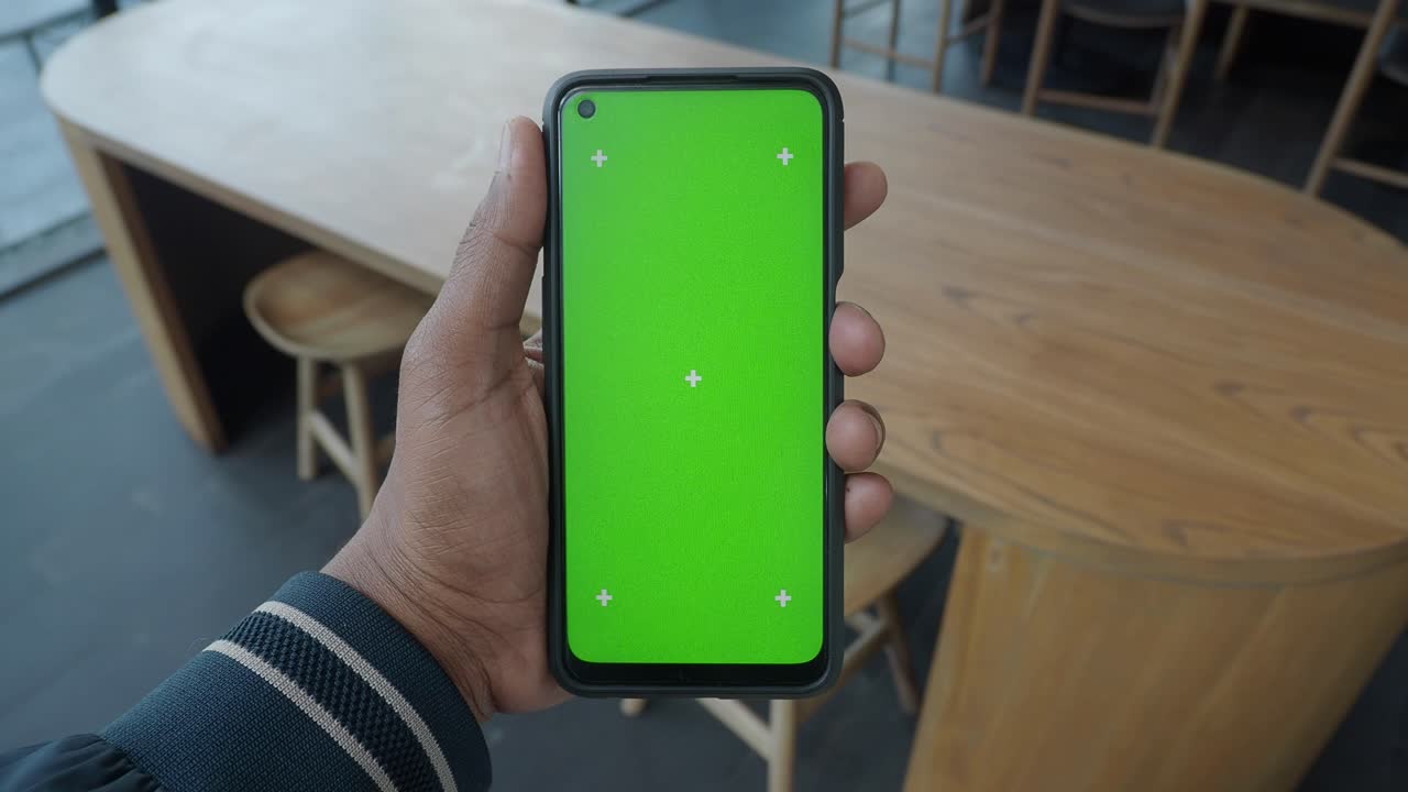 Smartphone con pantalla verde