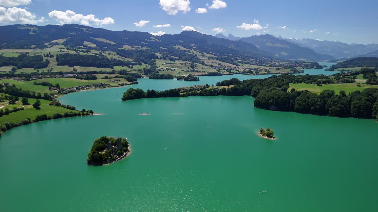 Le Bry island Greyerzersee Lake Gruyère region artificial reservoir aerial drone Switzerland