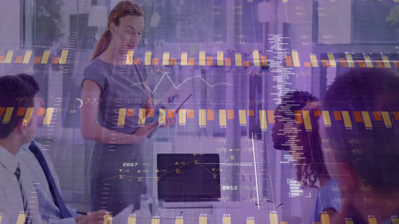 Analyzing financial data charts, business professionals in office using animation tools