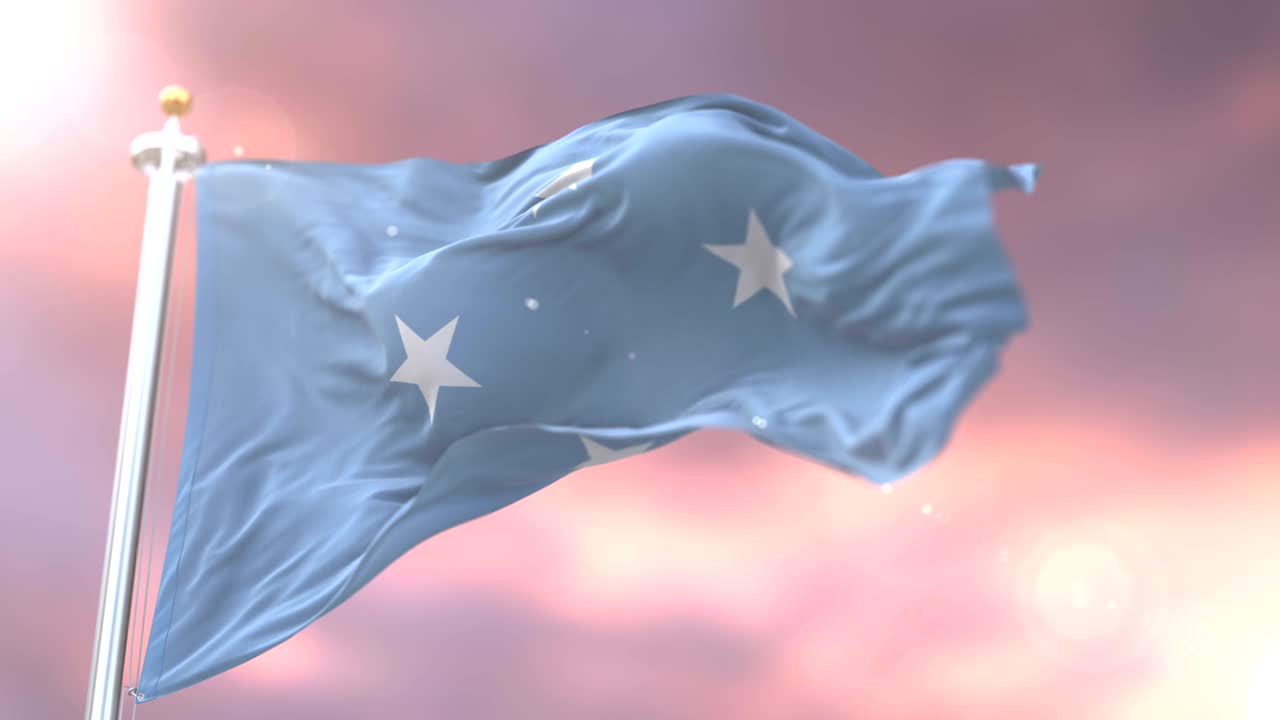 bandera de micronesia agitando en el viento al atardecer en lento, bucle