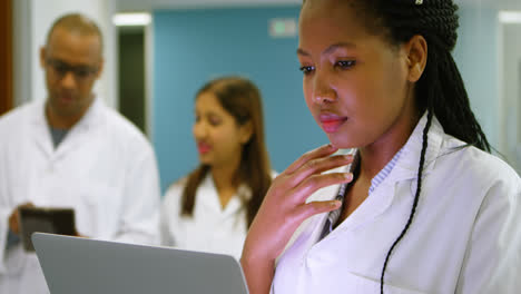 scientist using laptop in office 4k