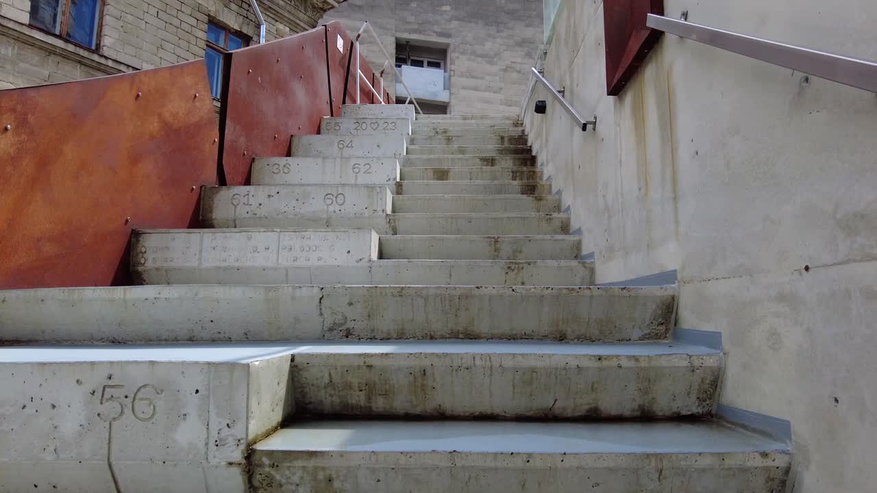 Multiple concrete stairs going up to the rooftop