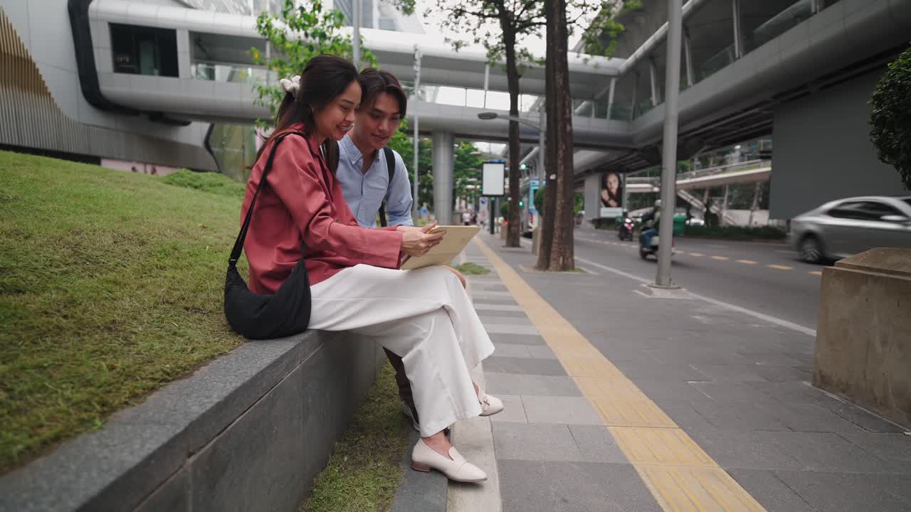 Young Couple Discussing on a City Street