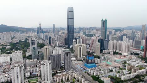 Luftaufnahme-über-Das-Stadtbild-Von-Shenzhen-Mit-Massiver-Stadtentwicklung-Und-Wolkenkratzern