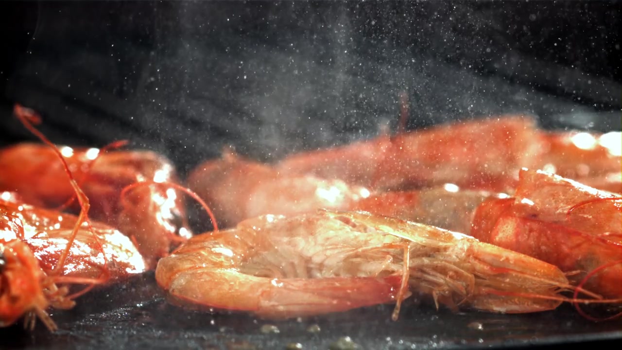 Fresh Shrimp and Prawns Sizzling on a Hot Grill