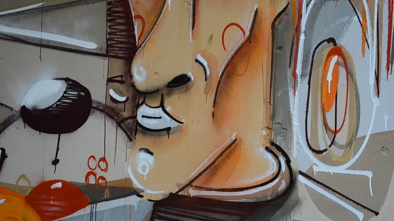 L'artista disegna graffiti, ritratto di persona con la pipa.