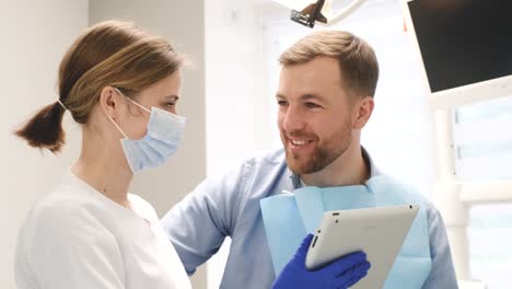 dental treatment in a modern dental clinic. the happy patient is satisfied with the dental treatment