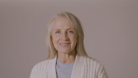 Portrait-Of-A-Senior-Woman-Smiling-At-Camera-1