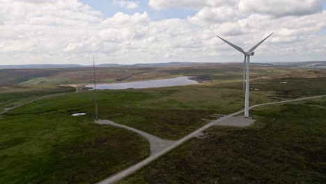 wind farm situated in halifax on the yorkshire moors taken using a drone