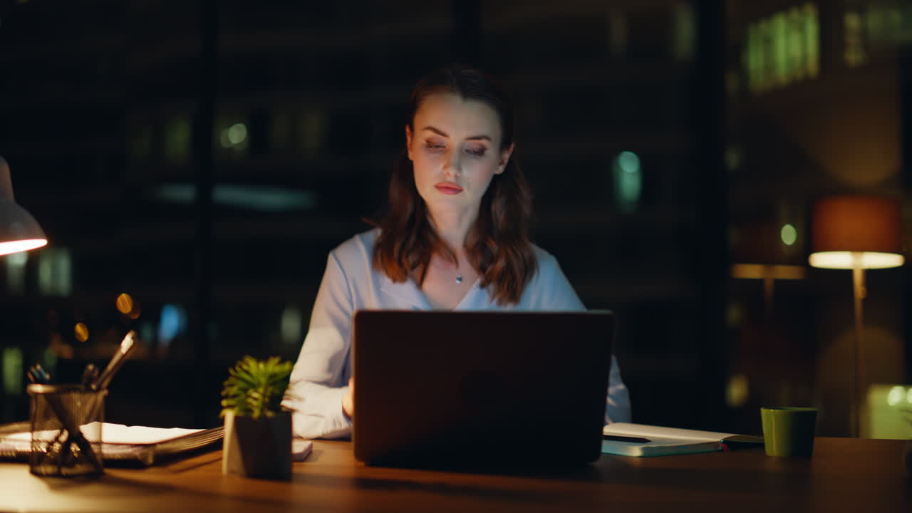 Stressed Woman Working Late at Night