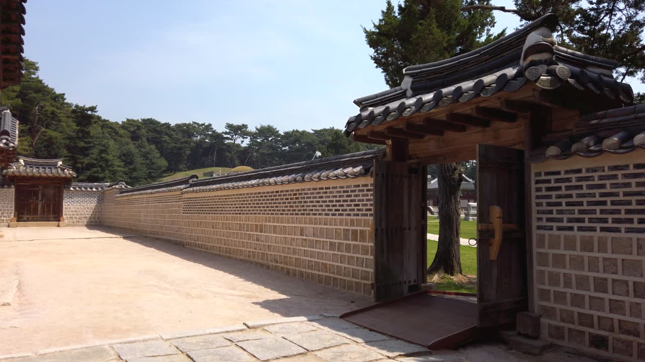 Wall and gate in Hongyureung Royal Tombs. Geumgok, South Korea.  Unesco World Heritage Site.
