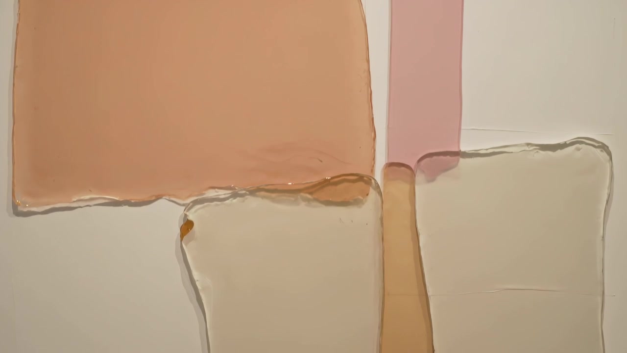 Settling peach beige paint swatches shifting and smoothing after pouring on paper with highlights