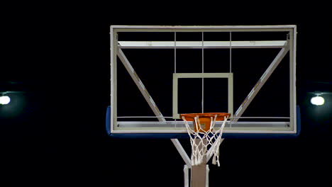 backboard and people playing basketball