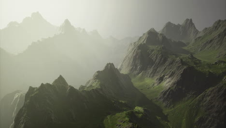 majestic mountain range illuminated by soft mist in early morning light