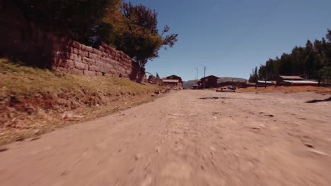 Walking-on-a-Peruvian-dirt-road-in-a-small-village-in-the-country