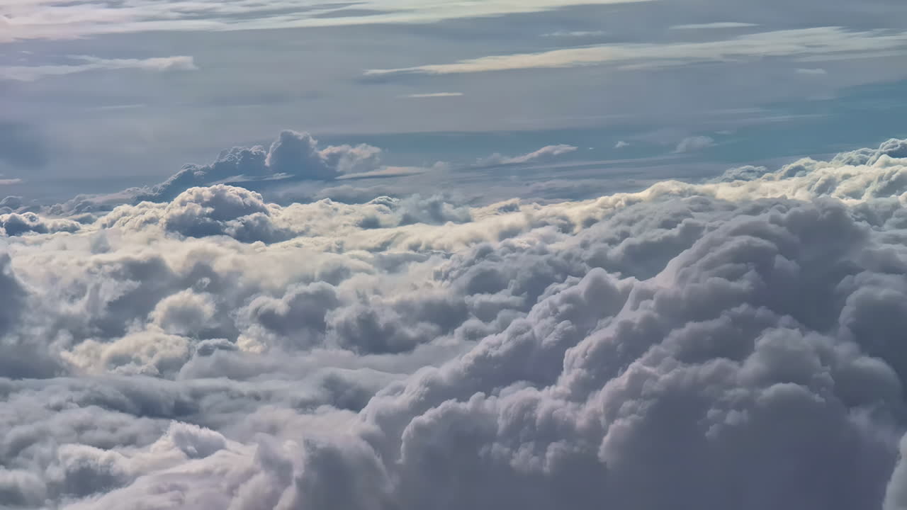 Clouds in the sky, viewed from above, showcasing a serene and peaceful atmosphere