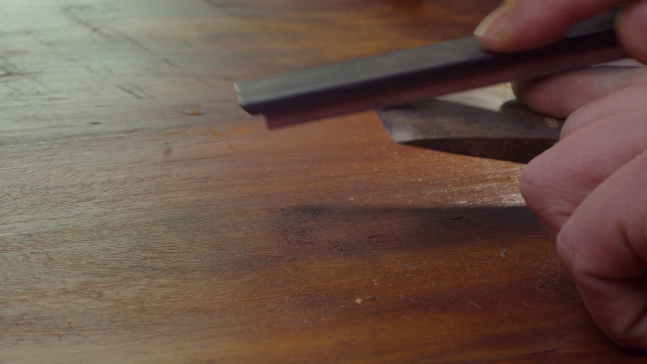 Sharpening stone used to hone a sharp new edge on old well-used axe