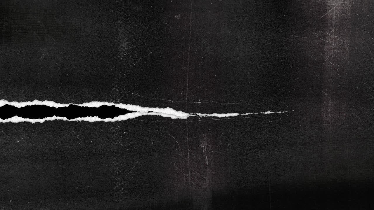 Transizione animata con rivelazione di carta nera strappata.