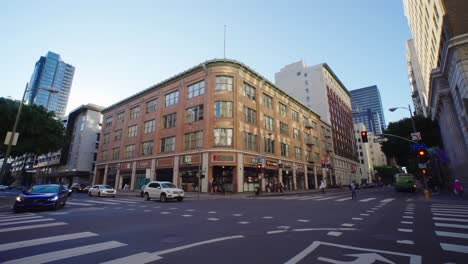 cars moving at the intersection in downtown. american modern urban lifestyle, tourism destination in usa