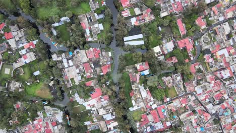 zenith view above canals and houses of xochimilco, mexico city