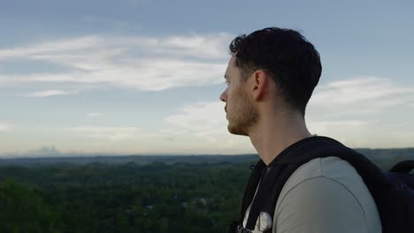 brave and adventurous backpacker man walking in philippines jungle