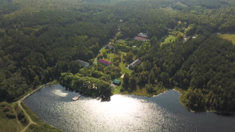 aerial view of a lakeside village in the forest