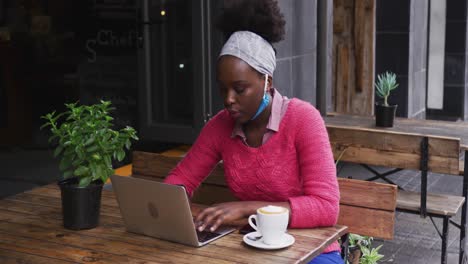african american sitting in a cafe