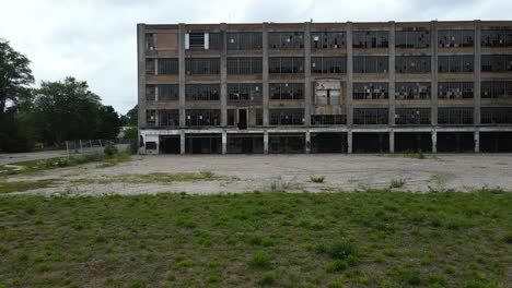 drone tracking shot near abandoned factory