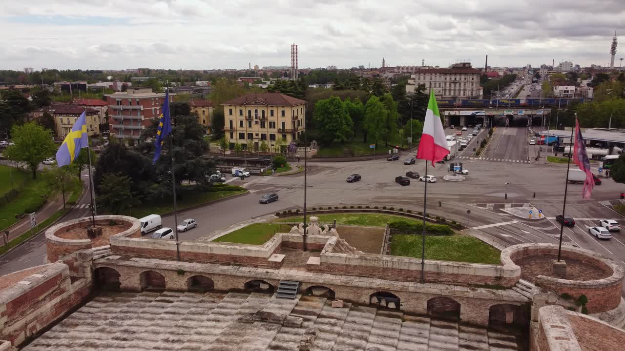 Flags Over Porta Nuova Historic City Gate In Verona, Veneto, Italy. Aerial Drone Shot