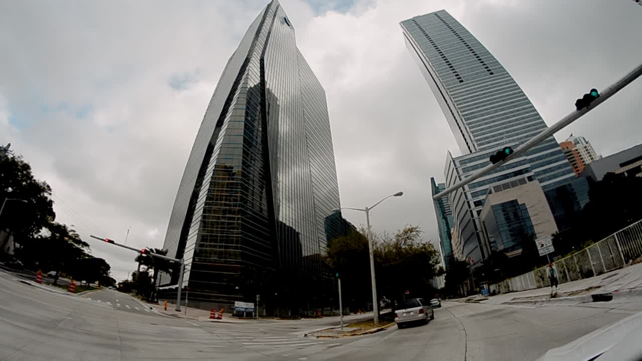 MIAMI, FL - FEBRUARY 2012: Driving along city road, view from moving car. Slow motion.