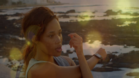 Woman-doing-stretches-on-the-beach.