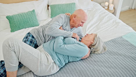 love, happy and senior couple on bed with romance